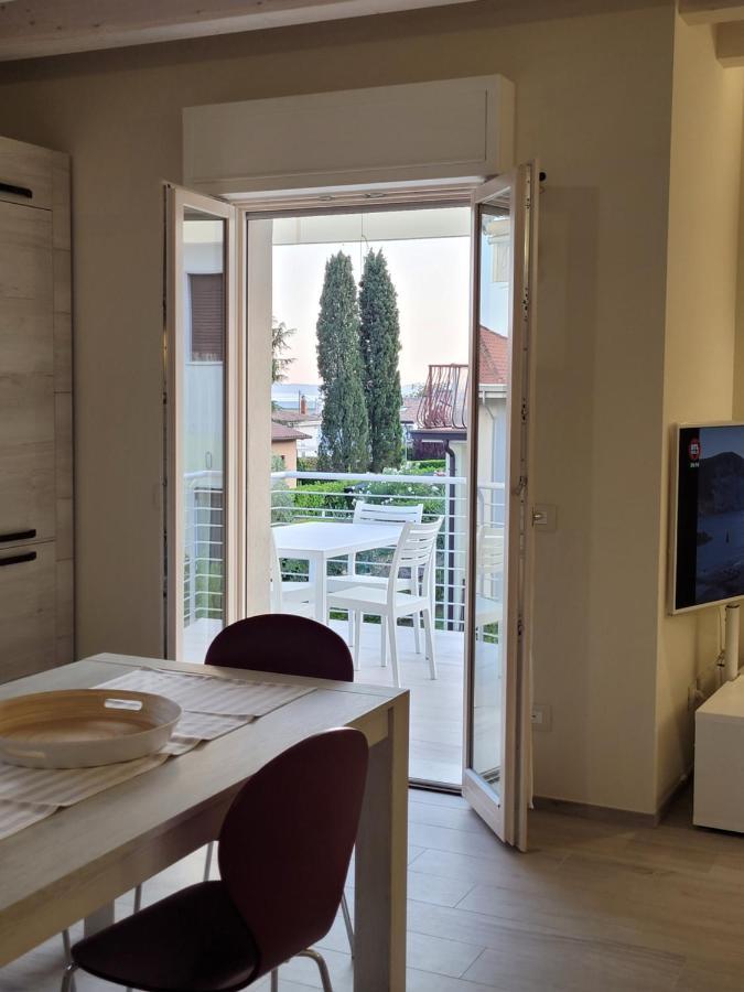 Garda View - Nuovo Appartamento Con Solarium Vista Lago ภายนอก รูปภาพ
